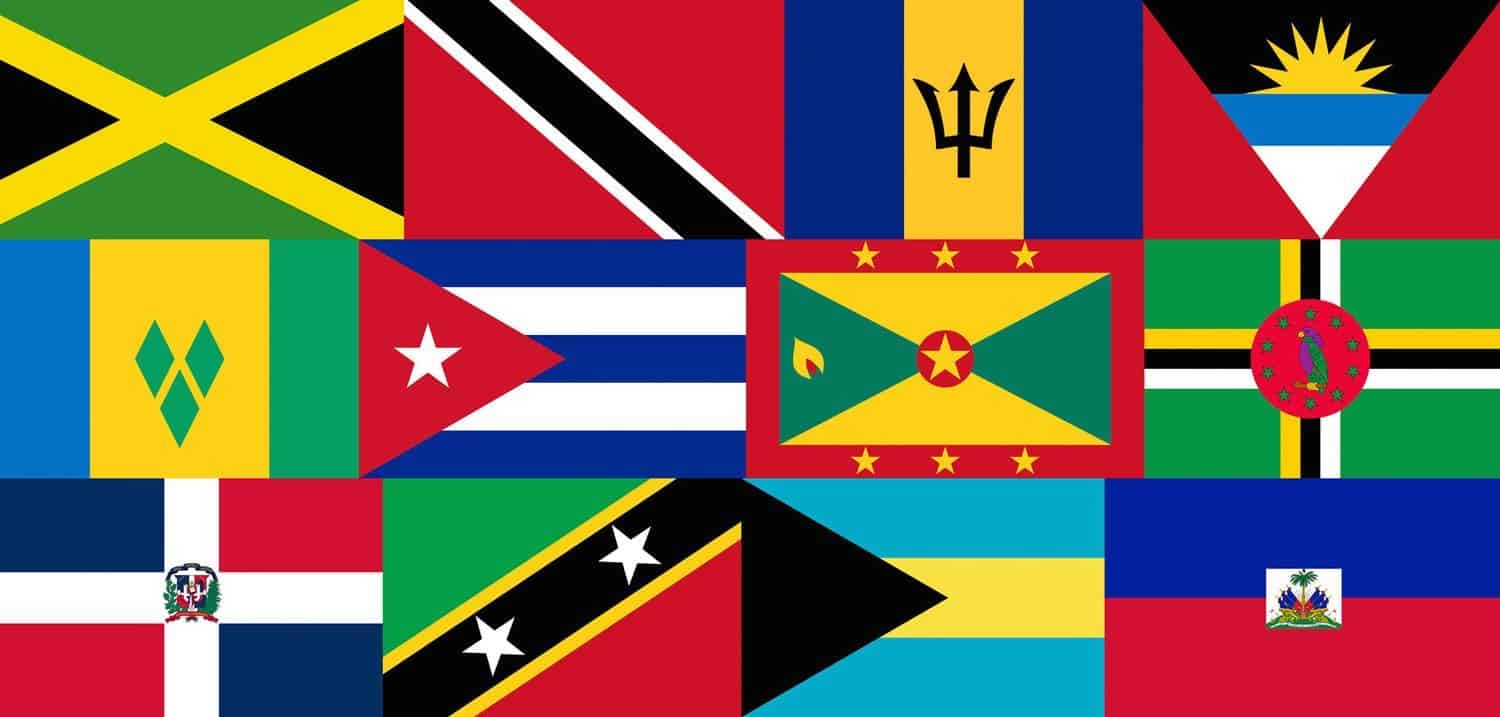 A grid of twelve Caribbean national flags, each with distinct colours and symbols, arranged side by side in two rows.